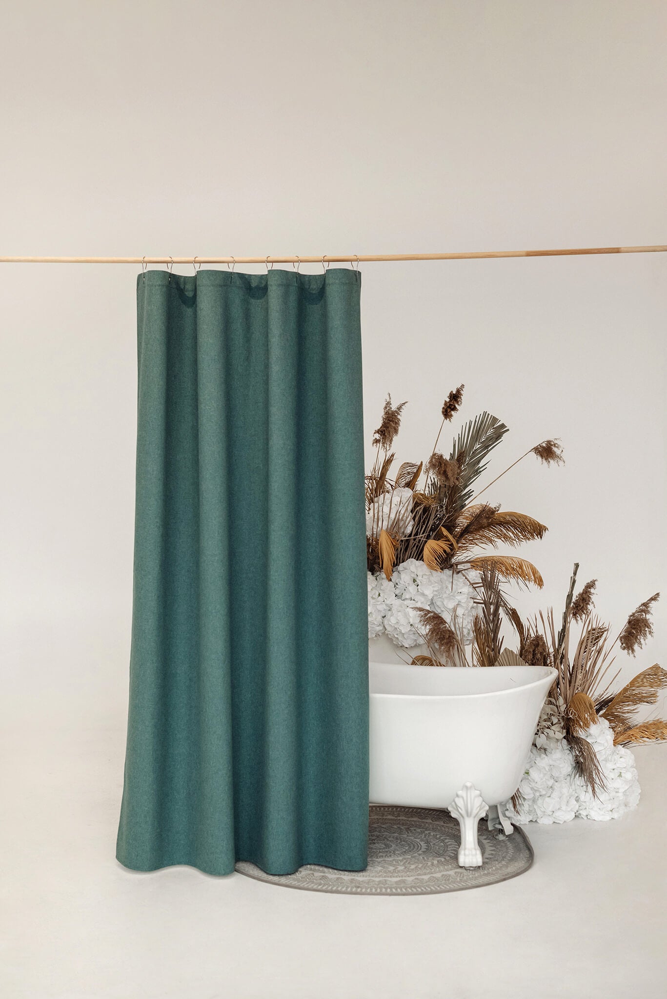 Green waterproof shower curtain with buttonholes for hooks