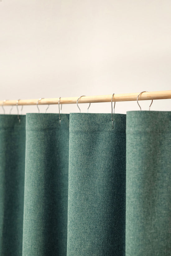 Green waterproof shower curtain with buttonholes for hooks